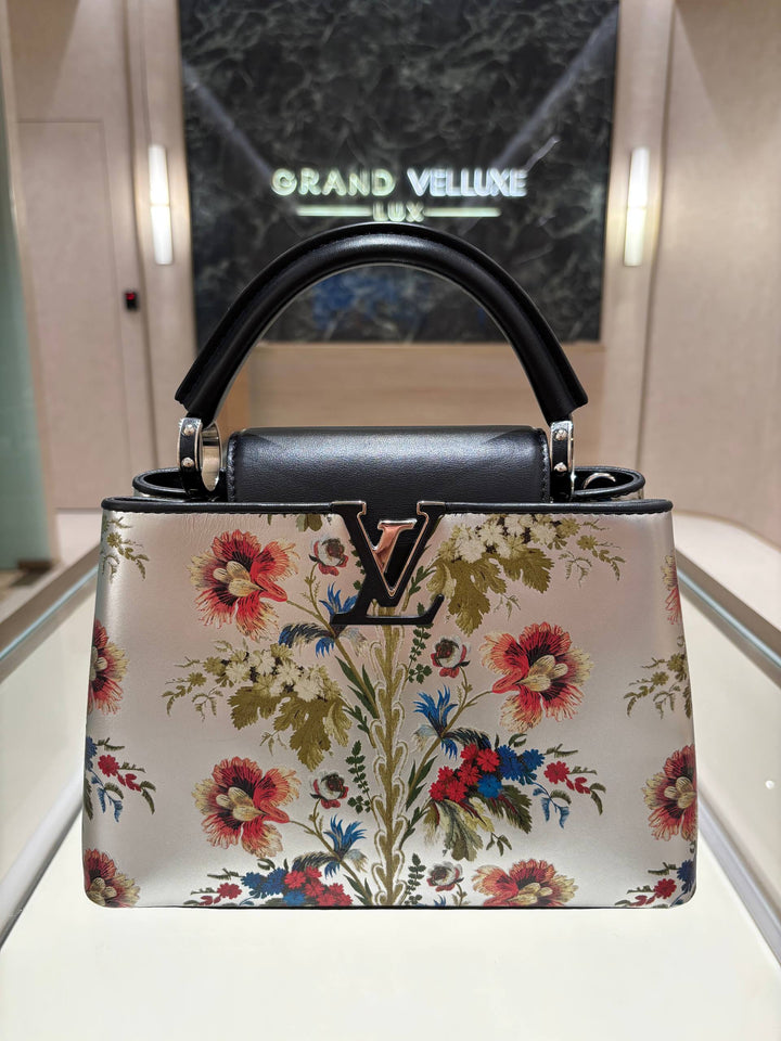 MICROCHIP LOUIS VUITTON CAPUCINES BB IN METALLIC SILVER CALFSKIN LEATHER WITH PRINTED FLORAL MOTIF