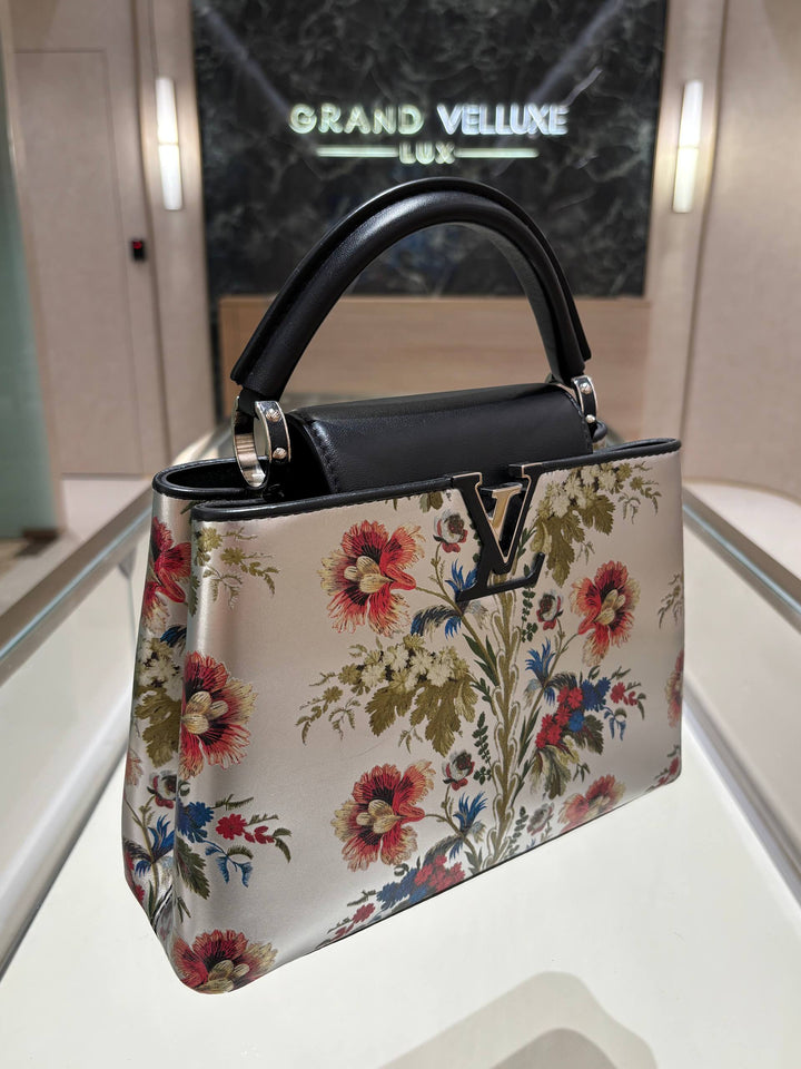 MICROCHIP LOUIS VUITTON CAPUCINES BB IN METALLIC SILVER CALFSKIN LEATHER WITH PRINTED FLORAL MOTIF