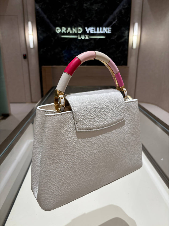 LOUIS VUITTON CAPUCINES BB LIMITED EDITION BAG IN WHITE TAURILLON LEATHER WITH RAINBOW TOP HANDLE